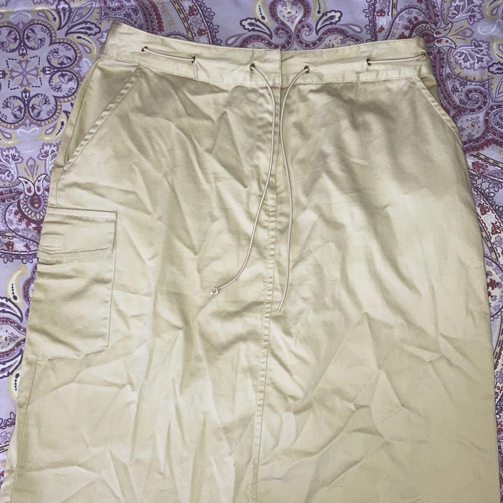 Tan skirt size8. Was given to me. I’ve never worn it.